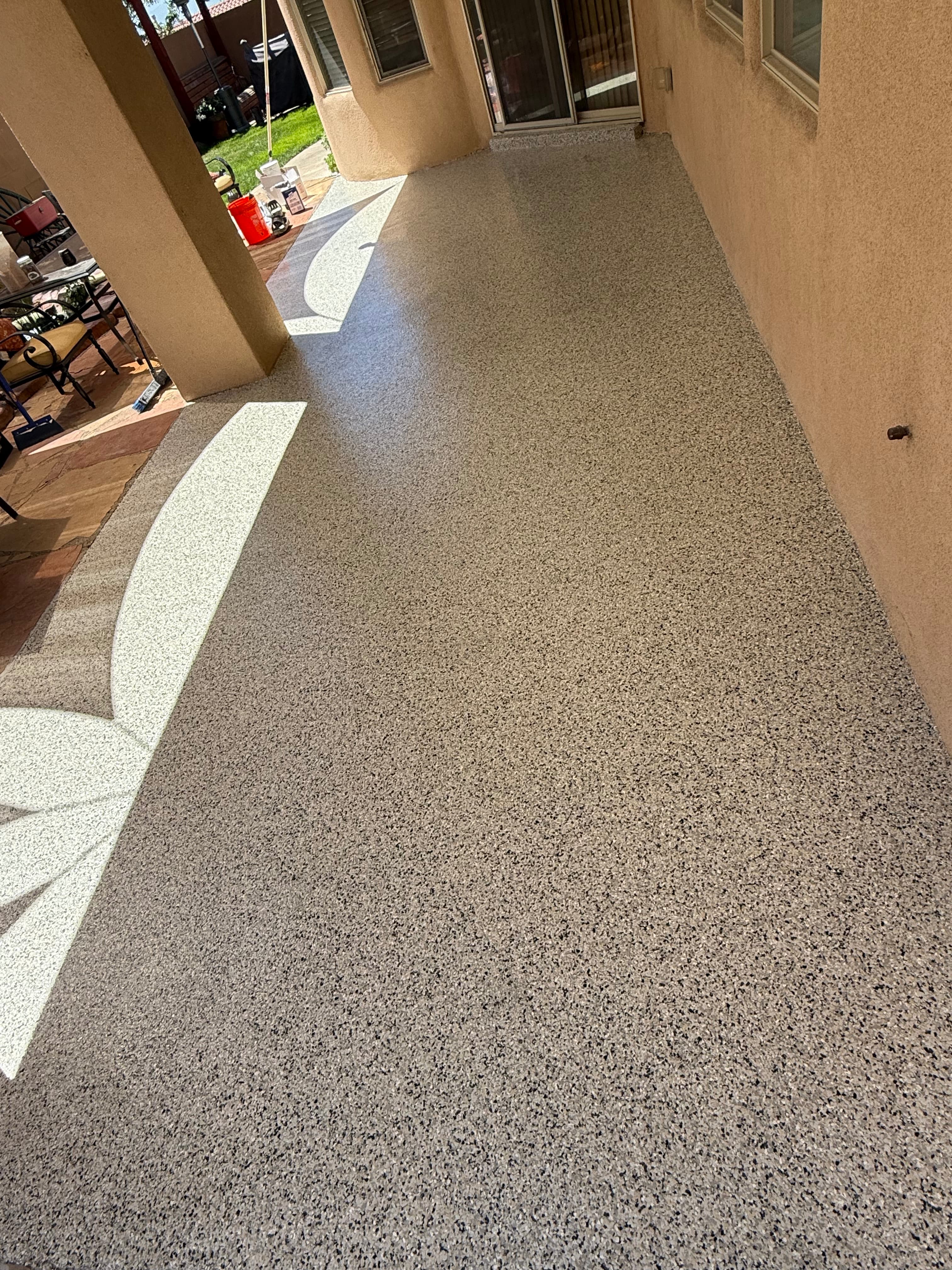 Covered patio with flake epoxy floor coating