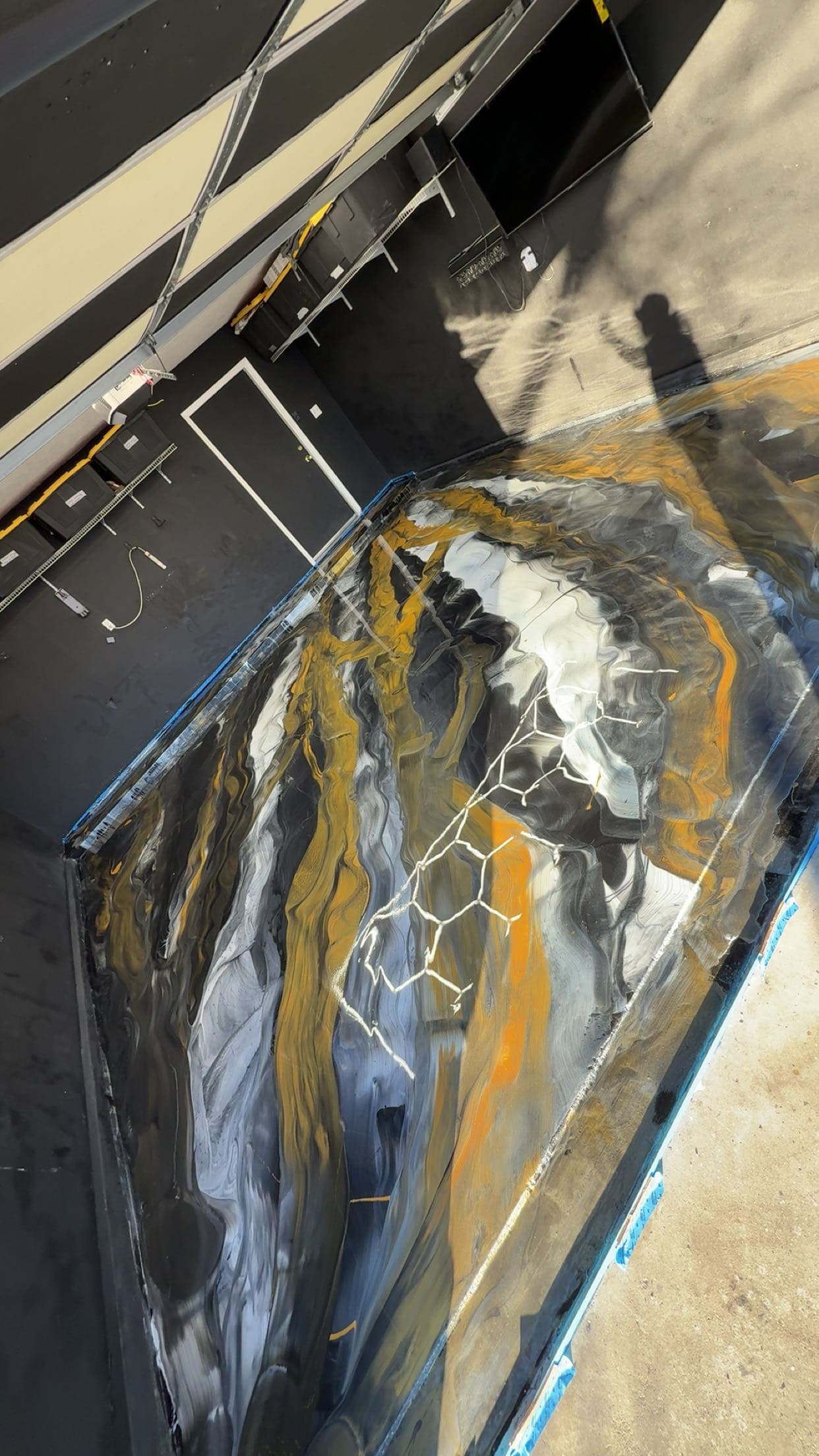 Designer metallic epoxy with blue and gold hexagon pattern